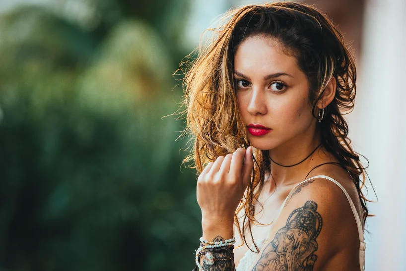 Portrait of a tattooed model with red lips — Faces series by CRZYPNDA